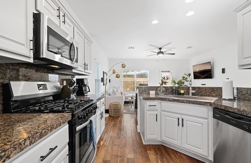 University Hills and Windsor Park House | Inviting East Side Digs with Heated Cowboy Pool