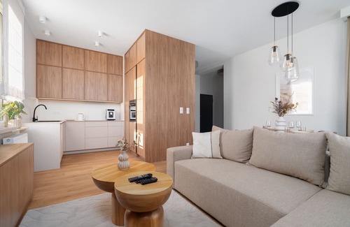 Poznan Apartment | Modern Beige Apartment in Poznań with Family Amenities