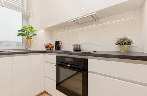 Bielany Apartment | Chic Loft Apartment with Parking and Breakfast Included