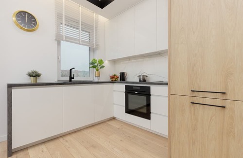 Bielany Apartment | Chic Loft Apartment with Parking and Breakfast Included