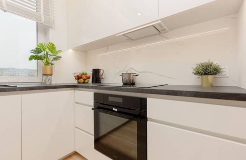 Bielany Apartment | Chic Loft Apartment with Parking and Breakfast Included
