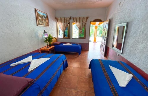 San Agustin Lanquin Hotel | Relax at Sueño de Tansu: Family-Friendly with Pool & Dining