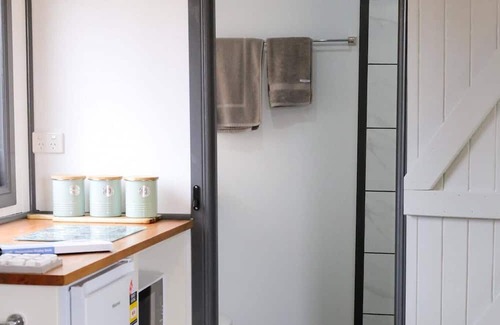 Barrine Cottage | Train Carriage in peaceful surrounds with mountain views on a farm.
