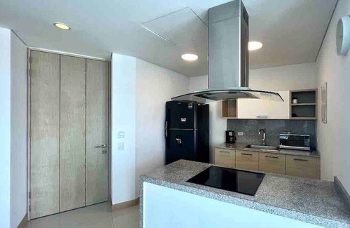 Riomar House | Elegant Apartment with Pool, Gym & Free Wi-Fi at Hilton