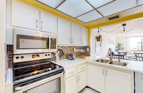 Palma del Mar Condo | Bay & golf course-view condo with pool, spa, fishing pier, & private balcony