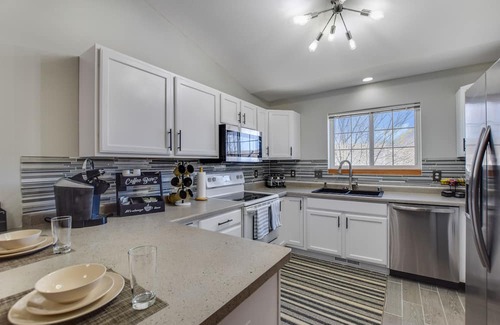 Deerfield House | Inviting Home with Hot Tub, Fire Pit & Theater Near Madison