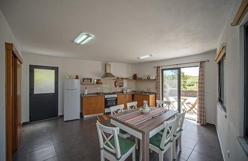 Praia do Norte House | Cozy Blue House with Ocean View & Breakfast Included