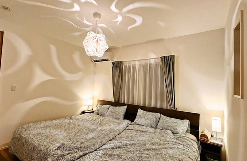 Ichinomiya House | Enjoy illuminations palm trees the majestic sea / Choseigun Chiba
