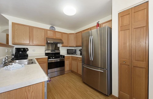 Romeoville House | Relax in Romeoville: Pet-Friendly Stay with Pool & Breakfast