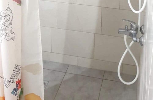 Porto Heli Apartment | Homerez - Studio for 2 ppl. with sea view, garden and terrace at Porto Heli
