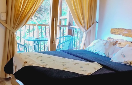 Manizales Cabin | Cozy Entre Pinos Hostal: Pet-Friendly Retreat with Spa
