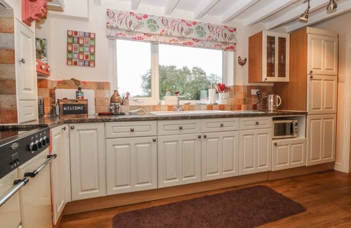 Newborough Cottage | RHIANFA, pet friendly, with open fire in Newborough