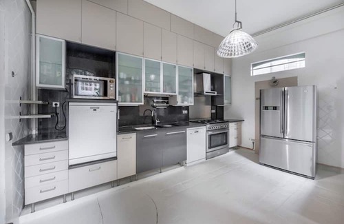 Arsenal Apartment | A Verdant Escape:580m2:Expansive Townhouse Nestled in a Marais Cul-de-Sac