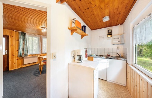 Kollm House | Bungalow '13 - Finnhütte' with Private Terrace and Shared Garden