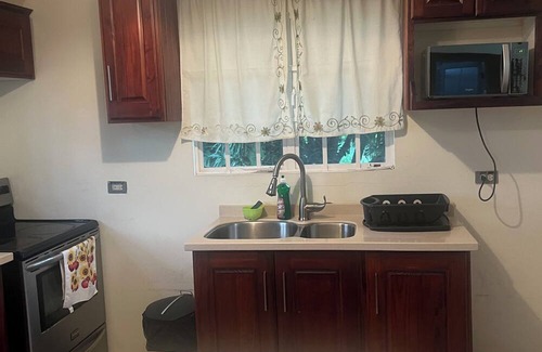 San Juan Apartment | Charming 2-bedroom apartment with AC in brilliant Champ Fleur.