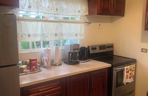 San Juan Apartment | Charming 2-bedroom apartment with AC in brilliant Champ Fleur.