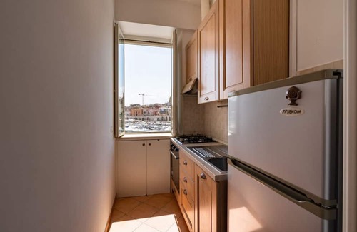 Bisceglie Apartment | Cozy 40 sqm ground floor apartment, perfect for two people.The property offers enchanting views of the sea and the port of Bisceglie and is perfectly located for exploring the city's most charming attractions. All main amenities and the nearest beaches a