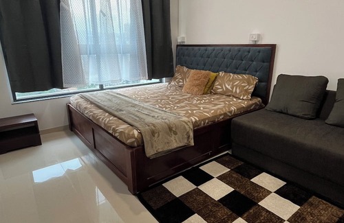 Thane West Apartment | Charming 1BHK apartment in welcoming Thane with AC