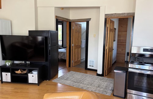 Pinedale Apartment | Large windows bring the outside in.