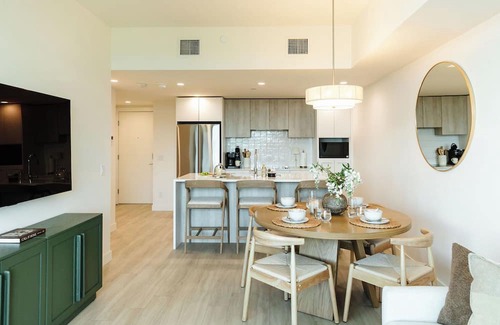 South Pandosy Condo | Enjoy lakefront living at its finest in this stylish condo! Relax by the pool, soak in the stunning water views, and unwind in comfort—just steps from the shoreline.