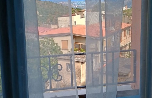 Villagrande Strisaili House | Holiday Home 'Sa Omu 'Eccia' with Sea View and Private Terrace