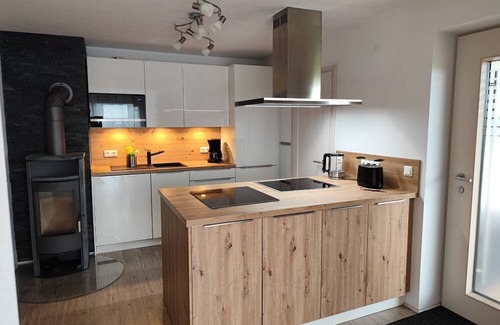 Durach Apartment | Modern bright apartment GRÜNTENSICHT for 2. persons mountain view and meadows invite you.