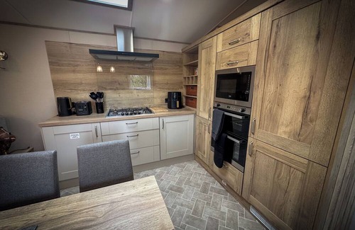 Longridge Cabin | Hobbit - House Of The Owl. Luxury lodge with views. Pet friendly. Indoor Pool.