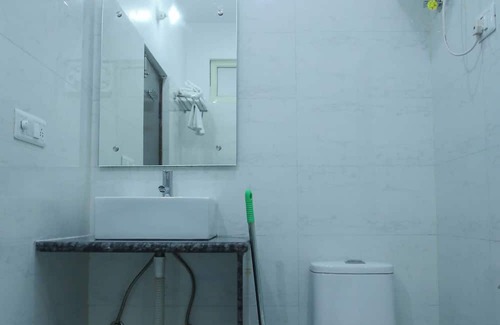 Taj Ganj Bed & Breakfast | Aradhana's Home Stay Deluxe Room with Balcony.
