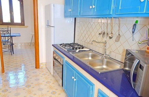 Marina San Gregorio House | Casa Ria B: A welcoming two-story apartment that is part of a villa situated at a short distance from the beach, with Free WI-FI.