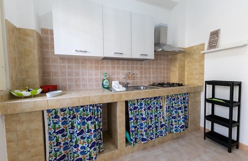 Peschici Apartment | Apartment 'Francesca, Trilo E' with Shared Terrace, Wi-Fi and Air Conditioning