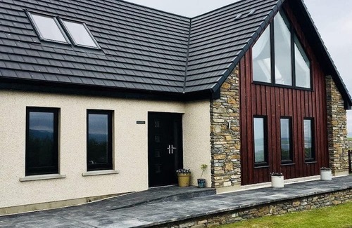 Stromness House | Switha- 3 bed home in Orkney, Scotland with hot tub and outstanding sea views