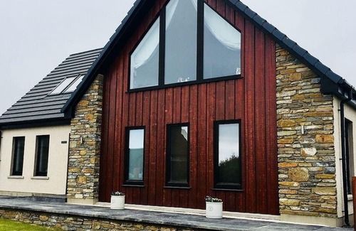 Stromness House | Switha- 3 bed home in Orkney, Scotland with hot tub and outstanding sea views