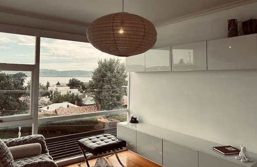 Sandy Bay Apartment | Panoramic water views, sunny and private - walk to beach, cafes and shops