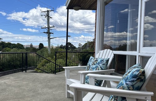 Sandy Bay Apartment | Panoramic water views, sunny and private - walk to beach, cafes and shops
