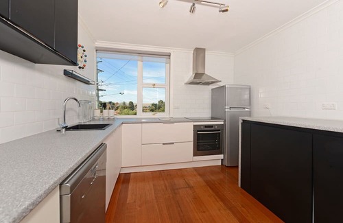 Sandy Bay Apartment | Panoramic water views, sunny and private - walk to beach, cafes and shops