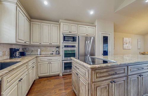 April Sound House | Spacious lake house with kitchen, patio with great view on the water & boat slip