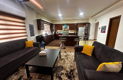 Suwailih Apartment | (5) 3-bedroom quiet apartment with free parking, balcony & sitting areas.