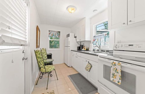 Mango Groves House | Steps from the Ocean - Pet Friendly Two Bed One Bath Beach Cottage