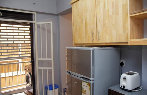 Central Kampala Apartment | Kololo Business Suite-Pool, Gym, fast internet/Work, Relax & Unwind