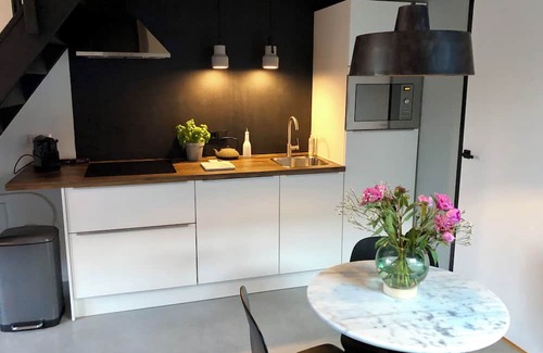 Heerlen Apartment | Apartment in south Limburg for two people in old school with sunny garden