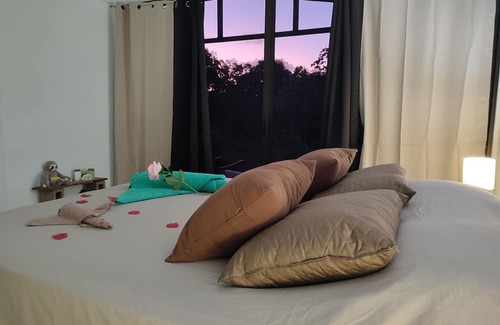 Las Lomas Bed & Breakfast | Kocorica Private room with terrace and bathroom in the countryside.