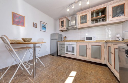 Punta Mujeres Ski Chalet | Casa Hibiscus - Shared Pool and BBQ - Close to Seafront Promenade By Lanzarote Vacation Homes