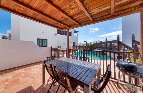 Punta Mujeres Ski Chalet | Casa Hibiscus - Shared Pool and BBQ - Close to Seafront Promenade By Lanzarote Vacation Homes