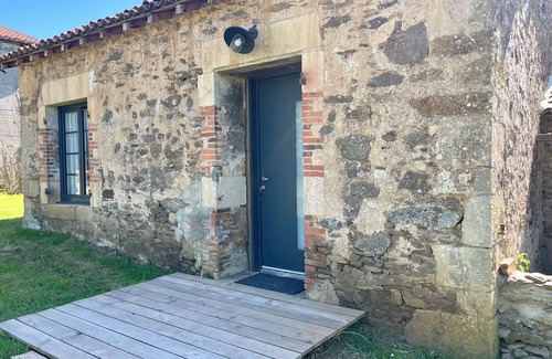 Monsireigne House | Renovated farmhouse guestroom with private terrace and lake view