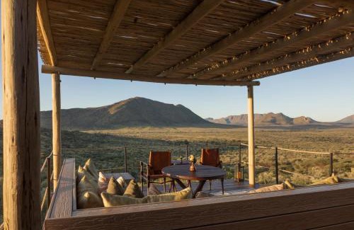 Windhoek Cabin | Gmundner Lodge: Oceanfront Escape with Spa & Pool Amenities