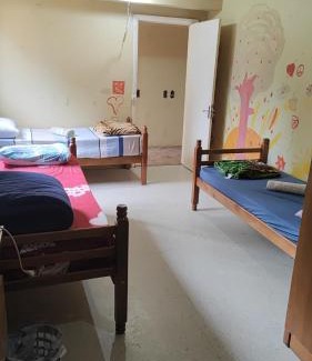 Nossa Senhora de Lourdes Apartment | Budget-Friendly Kitnet near UCS with Breakfast Included