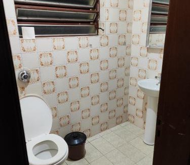 Nossa Senhora de Lourdes Apartment | Budget-Friendly Kitnet near UCS with Breakfast Included