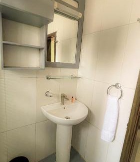 Igbobi Hotel | Budget-Friendly AHI Residence with Family Amenities