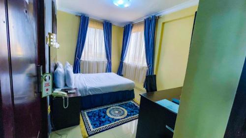 Igbobi Hotel | Budget-Friendly AHI Residence with Family Amenities