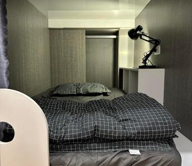 District 10 Hotel | Cozy Alphabet Home: Your Perfect Travel Getaway